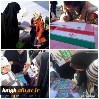 برپایی غرفه نقاشی توسط دانشجومعلمان پردیس حضرت معصومه (س) قم در مسیر راهپیمایی ۲۲ بهمن 2